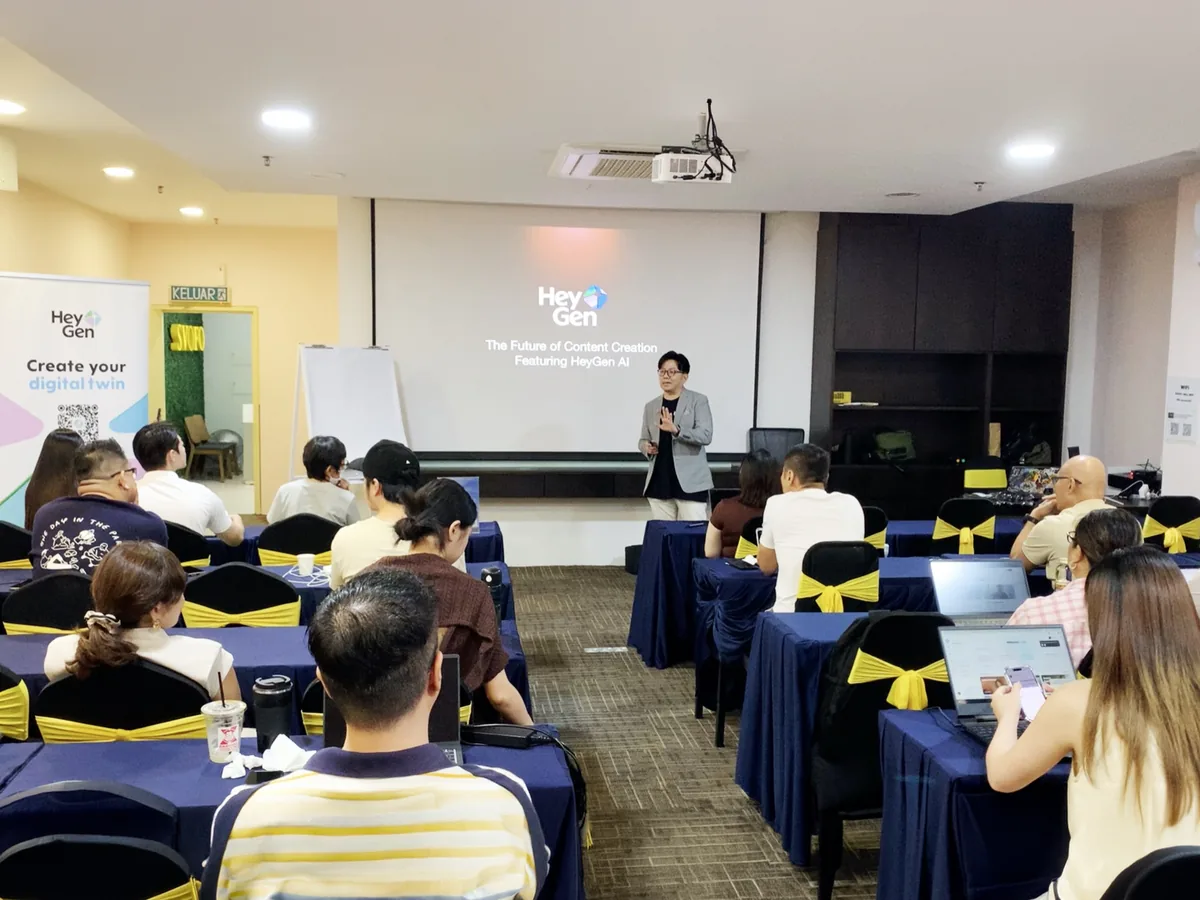 Han Yong presenting The Future of Content Creation featuring HeyGen AI to a full room