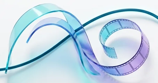 Ribbons of translucent film curling through the air