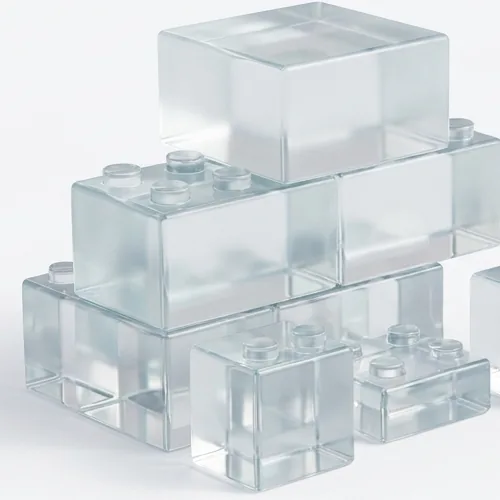 Clear glass building blocks of different sizes, stacked together