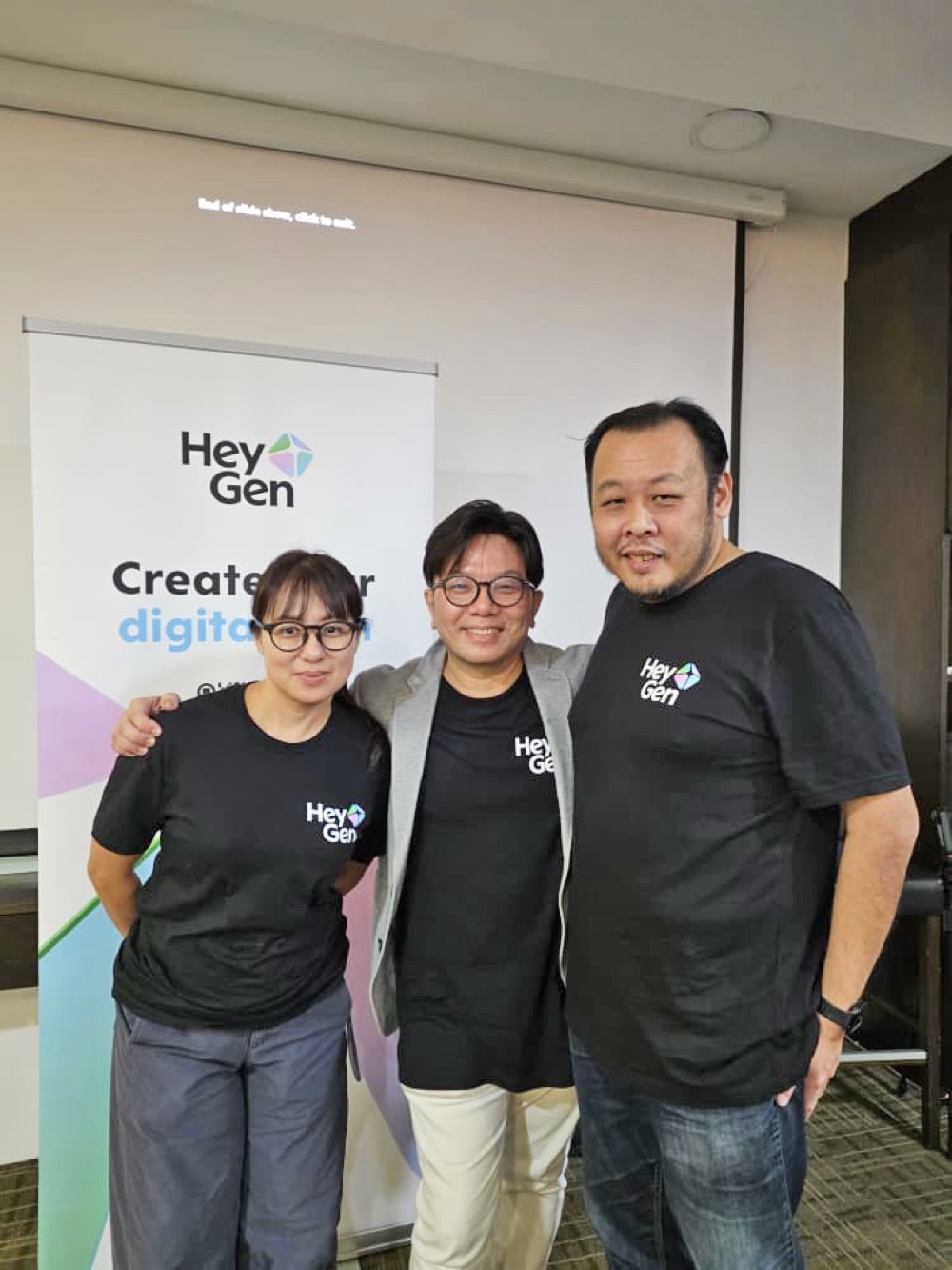 HeyGen Malaysia community hosts wearing HeyGen shirts